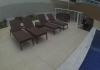 Solarium e Deck com cadeiras de apoio