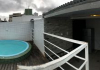 Piscina com deck privativo